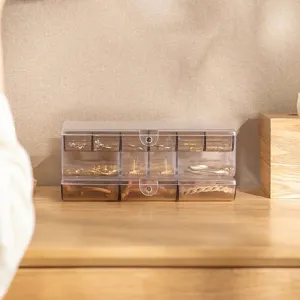 Caja de almacenamiento de joyas apilable transparente con compartimentos para aretes