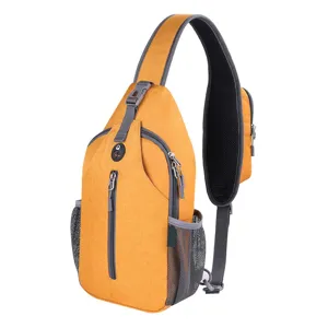 Detailed view of yellow water-resistant outdoor sling bag for men with mesh side pockets