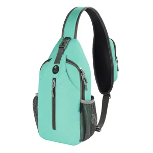 Detailed view of a mint green waterproof outdoor sling bag with mesh side pockets