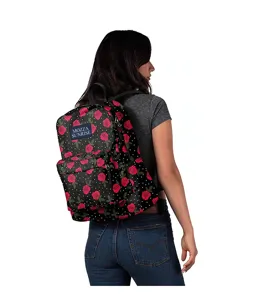Stylish black lightweight backpack featuring red rose floral pattern and white polka dots