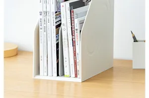 Close-up of white minimalist metal desktop bookend organizer holding magazines and books