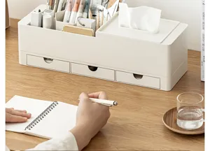 Detail van multifunctionele bureau-organizer met opbergvakken en handige servethouder.