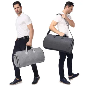 Large capacity travel duffel bags shown in grey and charcoal colors with carrying modes