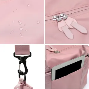 Detail view of pink travel bag with waterproof fabric, SBS zippers and side pocket