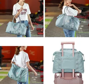 Versatile light blue travel duffel bag shown carried by model and fixed on luggage.