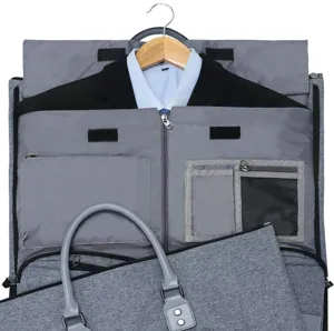 Macro view of interior compartments in a gray folding garment travel bag for men's suits