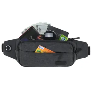 Detailed view of grey sports waist bag showing large capacity with various travel essentials