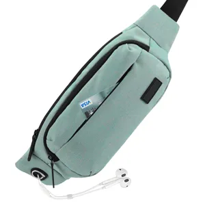 Detail view of light green sports waist bag with earphone port and front pocket