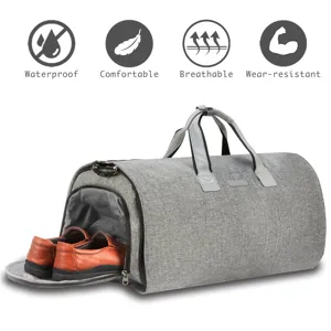 Large gray travel duffel bag with shoe compartment and waterproof fabric detail