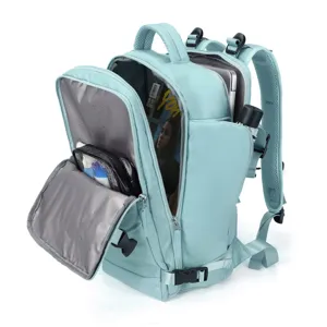Internal compartments of a mint green travel backpack showing storage capacity
