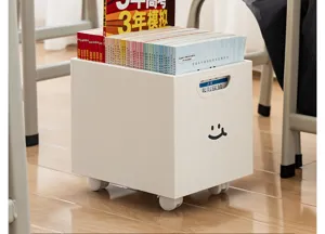 Caja de almacenamiento móvil blanca con ruedas y detalle de sonrisa para libros