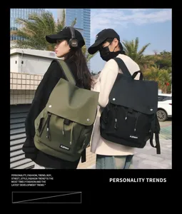 Two models outdoors wearing high-capacity waterproof urban backpacks in olive green and black