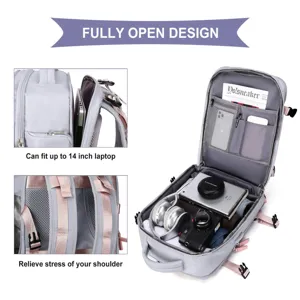 Detail view of large travel backpack showing 14-inch laptop fit and open design.