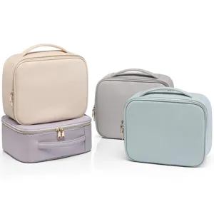 Juego de cuatro neceseres de piel PU Saffiano en colores pastel con cremalleras doradas