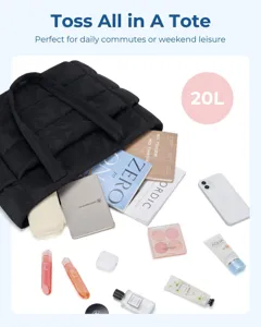 Large capacity black quilted puffer tote bag shown with daily essentials and 20L mark