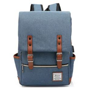 Detailed view of blue vintage canvas laptop backpack with USB charging port