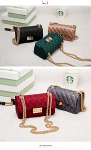 Close-up detail of matte jelly bags in multiple colors featuring golden chains.