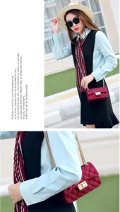 Detailed view of a red matte quilted jelly crossbody bag with gold lock and chain strap