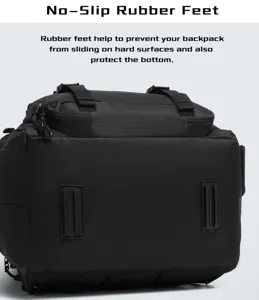 Detail view of non-slip rubber feet on the bottom of a black fishing backpack