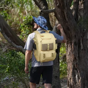 Yellow outdoor fishing backpack with multiple compartments shown in a forest scene