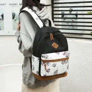 Sac à dos décontracté à fleurs pour femmes, parfait pour l'école et les loisirs.