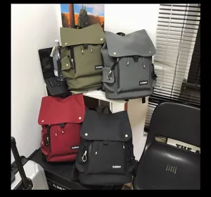 Large capacity waterproof backpacks in multiple colors featuring stylish flap cover design