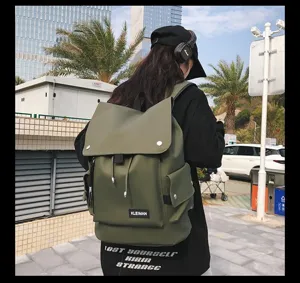 Waterproof olive green large capacity backpack for students and travel outdoor use