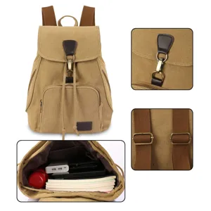 Vintage khaki canvas backpack detail showing interior capacity and metal clip closure