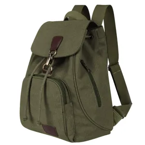 Detail showing side zipper and canvas texture of this vintage green outdoor backpack