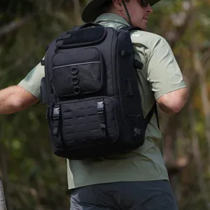 Detailed rear view of a black multi-functional outdoor fishing backpack on a model.