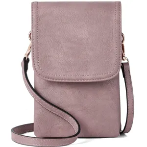 Detailed view of dusty rose PU leather crossbody phone bag with a textured finish
