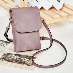 Close-up detail of a purple PU leather mobile phone crossbody bag with adjustable strap