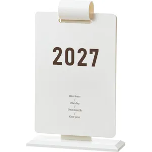 Calendario da tavolo bianco minimalista 2027 con citazioni di autodisciplina giornaliera