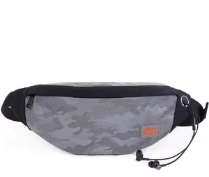 Grey camouflage travel waist bag with earphone port and orange logo patch detail