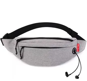 Close-up of grey ultralight travel waist bag with a dedicated headphone jack detail