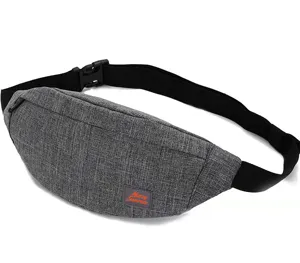 Detail view of a grey marl ultra-light travel waist bag with black adjustable strap