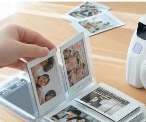Close-up of 3-inch transparent photo album showing photo insertion detail