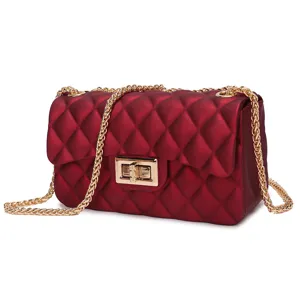 Elegant matte burgundy jelly crossbody bag featuring diamond quilting and gold chain