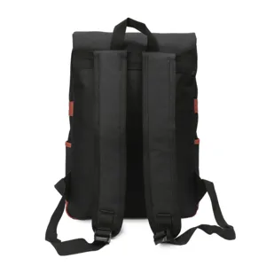 Mochila escolar de lona negra informal con correas ajustables y detalles marrones