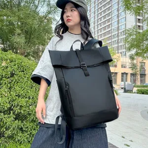 Minimalist large capacity black rucksack with roll-top design for business and travel