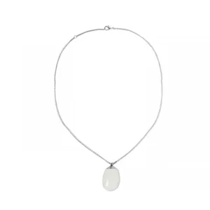 Detailed view of a minimalist necklace with a smooth white enamel oval pendant on a silver chain