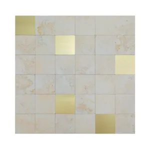 Detailed shot of square mosaic tile panel featuring beige stone texture and gold foil accents.