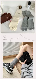 Close-up detail of women's comfortable split-toe cotton mid-calf socks in various colors