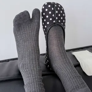 Detail shot of women's split toe mid calf socks, solid color tabi socks for spring and summer.