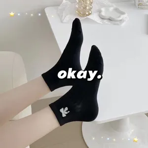 Black short socks for women with sparkly bow embroidery, cute Japanese style breathable cotton.