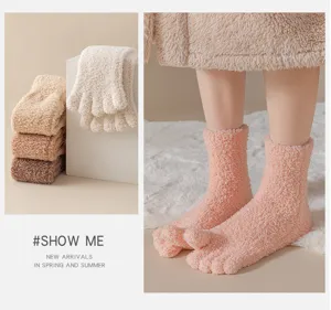 Detail view of soft coral fleece five-finger socks for women in various cozy solid colors