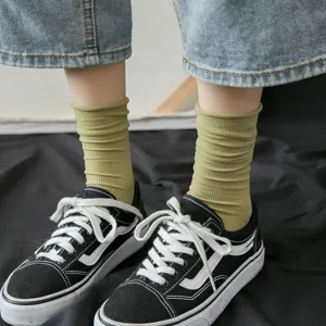 Thin velvet slouch socks for women in avocado green with elegant ribbed texture