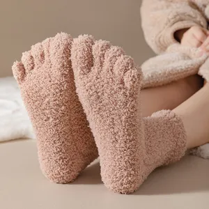 Cozy coral fleece five-toe socks for women in soft pink color
