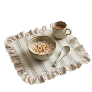 Elegant ruffled linen placemat with green stripes for home and restaurant table decor