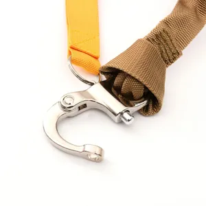 Tactical lanyard detail shot showing metal snap hook and heavy-duty elastic webbing.
